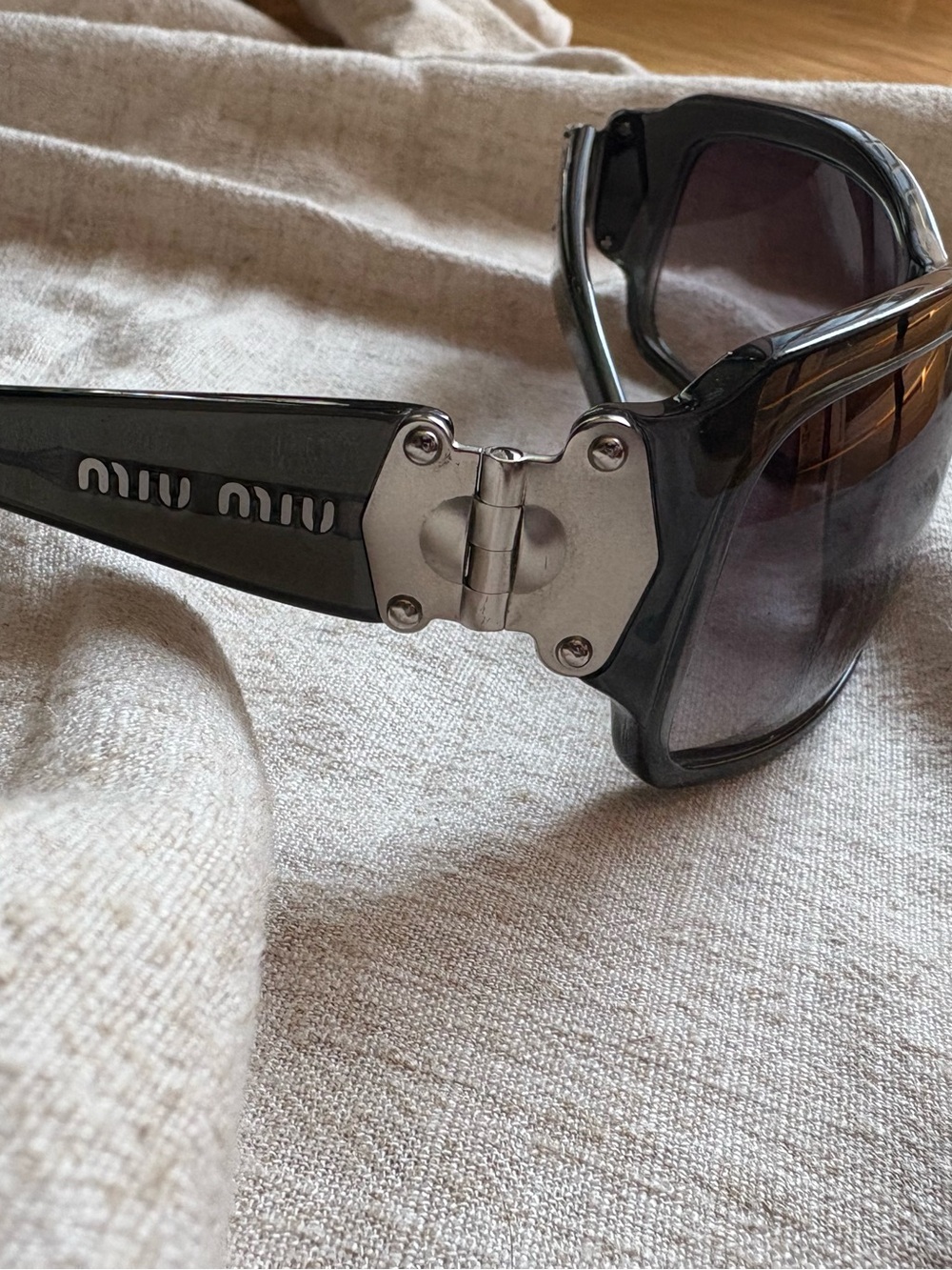 Mui Miu chunky sunglasses